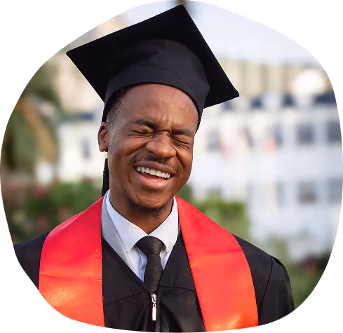 An international student in graduation cap and gown